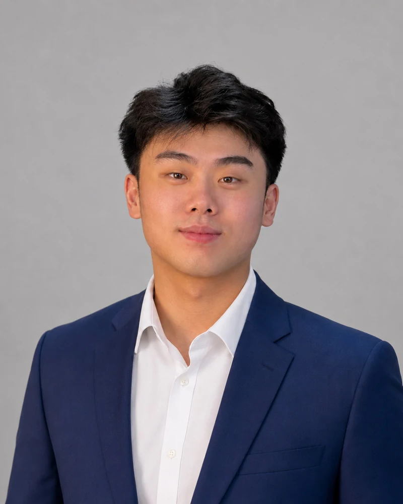 Yatson Matais, founder of Cabana Club and WEEBIE, in a navy suit studio portrait